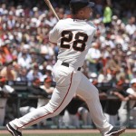 San Francisco Giants' Buster Posey watches his RBI double off Arizona Diamondbacks' Ian Kennedy during the first inning of a baseball game Sunday, May 30, 2010, in San Francisco. (AP Photo/Ben Margot)