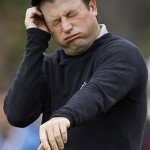 Tim Clark of South Africa reacts after leaving a birdie putt short on the first hole during the first round of the U.S. Open golf tournament Thursday, June 17, 2010, at the Pebble Beach Golf Links in Pebble Beach, Calif. (AP Photo/Chris Carlson)