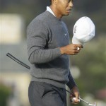 Tiger Woods walks off the 18th green after his first round of the U.S. Open golf tournament Thursday, June 17, 2010, at the Pebble Beach Golf Links in Pebble Beach, Calif. (AP Photo/Eric Risberg)