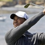 Tiger Woods hits a shot on the seventh hole during the first round of the U.S. Open golf tournament Thursday, June 17, 2010, at the Pebble Beach Golf Links in Pebble Beach, Calif. (AP Photo/Chris Carlson)