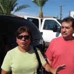 Eduardo and Gisela Diaz of Mexico City talk about Arizona's new immigration law outside the Mexican consulate in Phoenix on Wednesday. The couple came to Phoenix on since-expired tourist visas in 1989 but say they've been approved for U.S. residency, although they haven't yet received their documents. They sought advice because they were worried about what would happen to their 3-year-old granddaughter if they were pulled over by police and taken to a detention center. (AP Photo/Amanda Lee Myers)
