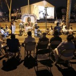 Dozens attend an overnight vigil at the Arizona Capitol late Wednesday, July 28, 2010 in Phoenix, only hours after portions of Arizona's new immigration law, SB1070, was blocked by a federal judge. (AP Photo/Ross D. Franklin)