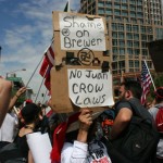 Protestors march against SB1070 which went into effect in limited fashion Thursday, July 29. (Jim Cross/KTAR)