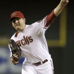 Arizona Diamondbacks' Joe Saunders throws against the Washington Nationals during the first inning of a baseball game Tuesday, Aug. 3, 2010, in Phoenix. (AP Photo/Ross D. Franklin)