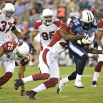 Tennessee Titans wide receiver Nate Washington (85) is brought down by Arizona Cardinals safety Adrian Wilson (24) in the first quarter of a preseason NFL football game on Monday, Aug. 23, 2010, in Nashville, Tenn. (AP Photo/Frederick Breedon)