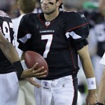 Arizona Cardinals quarterback Matt Leinart (7) is handed the football before he goes into the game during the first quarter of a preseason NFL football game against the Thursday, Sept. 2, 2010 in Glendale, Ariz. (AP Photo/Paul Connors)