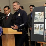In this Sept. 7, 2010, photo, Los Angeles Police Chief Charlie Beck, right, with Los Angeles Mayor Antonio Villaraigosa, middle, and Police Commission Police Commissioner John Mack, far left, present investigation photos of a police involved fatal shooting of Manuel Jamines, a 37-year-old Guatemalan construction worker on Sept. 5. Police mobilized Wednesday to avoid more mayhem on the streets after being taken by surprise at consecutive nights of violent protests sparked by the fatal shooting of a knife-wielding man. (AP Photo/Damian Dovarganes)