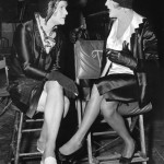 In a 1959 file photo Jack Lemmon, left, and Tony Curtis are in costume as women for the film "Some Like It Hot." (AP Photo/file)
