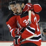 New Jersey Devils' Mark Fayne, right, celebrates his first NHL goal with teammate Travis Zajac during the first period of an NHL hockey game against the Phoenix Coyotes, Wednesday, Dec. 15, 2010, in Newark, N.J. (AP Photo/Bill Kostroun)