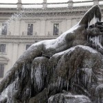 Icicles covers part of the statue of the Naiadi fountain in downtown Rome, as temperatures dropped below zero with heavy snowfall hitting most of Italy, Friday, Dec. 17, 2010. (AP Photo/Alessandra Tarantino)