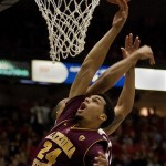 Arizona States' Trent Lockett (24) grabs the rebound from Arizona's Jamelle Horne, back, in the first half of an NCAA college basketball game at McKale Center, Saturday, Jan. 15, 2011, in Tucson, Ariz. (AP Photo/Wily Low)