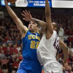 UCLA' Reeves Nelson (22) shoots over Arizona's Jamelle Horne (42) in the first half of an NCAA college basketball game at McKale Center in Tucson, Ariz., Thursday, Jan. 27, 2011. (AP Photo/Wily Low)