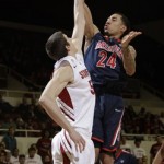 Arizona guard Brendon Lavender (24) shoots over Stanford forward Jack Trotter (50) during the first half of an NCAA college basketball game in Stanford, Calif., Thursday, Feb. 3, 2011. (AP Photo/Paul Sakuma)