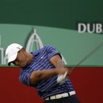 Tiger Woods tees off on the 2nd hole during the Pro-Am at the Emirates Golf Club a day ahead of Dubai Desert Classic golf tournament in Dubai, United Arab Emirates, Wednesday Feb. 9, 2011. (AP Photo/Kamran Jebreili)