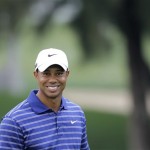 Tiger Woods reacts in front of the camera during the Pro-Am at the Emirates Golf Club a day ahead of Dubai Desert Classic golf tournament in Dubai, United Arab Emirates, Wednesday Feb. 9, 2011. (AP Photo/Kamran Jebreili)