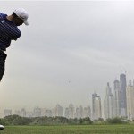 American Tiger Woods plays a shot on the 8th hole during the Pro-Am at the Emirates Golf Club a day ahead of Dubai Desert Classic golf tournament in Dubai, United Arab Emirates, Wednesday Feb. 9, 2011. (AP Photo/Kamran Jebreili)