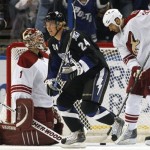Tampa Bay Lightning's Johan Harju (24), of Sweden, celebrates his team's first goal in front of Phoenix Coyotes goalie Jason LaBarbera, left, and Michal Rozsival, of Czech Republic, during the first period of an NHL hockey game Wednesday, Feb. 23, 2011, in Tampa, Fla. (AP Photo/Mike Carlson)