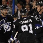 Tampa Bay Lightning's Vincent Lecavalier, right, celebrates his first-period goal with teammates Steven Stamkos and Teddy Purcell (16) in an 8-3 win over the Phoenix Coyotes in an NHL hockey game Wednesday, Feb. 23, 2011, in Tampa, Fla. (AP Photo/Mike Carlson)