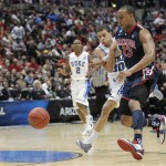 Duke's Seth Curry (30) and Arizona's Derrick Williams (23) race for a loose ball during the first half of a West regional semifinal in the NCAA college basketball tournament, Thursday, March 24, 2011, in Anaheim, Calif. (AP Photo/Jae C. Hong)