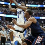 Duke's Kyrie Irving (1) shoots over Arizona's Derrick Williams (23) during the first half of a West regional semifinal in the NCAA college basketball tournament Thursday, March 24, 2011, in Anaheim, Calif. (AP Photo/Mark J. Terrill)