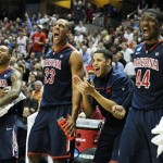 Arizona's Lamont Jones (12), Derrick Williams (23), Solomon Hill (44) and another player react during the second half of a West regional semifinal against Duke in the NCAA college basketball tournament, Thursday, March 24, 2011, in Anaheim, Calif. (AP Photo/Mark J. Terrill)