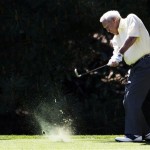 Arnold Palmer hits off the fourth fairway during the Par 3 competition before the Masters golf tournament Wednesday, April 6, 2011, in Augusta, Ga. (AP Photo/David J. Phillip)
