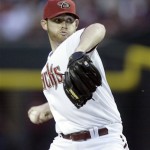 Arizona Diamondbacks' Ian Kennedy pitches against the Cincinnati Reds in the first inning of an MLB baseball game Friday, April 8, 2011, in Phoenix. (AP Photo/Paul Connors)