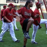 Cardinals WR Larry Fitzgerald stretches before batting practice at Chase Field Tuesday, April 12, 2011. (Adam Green/Arizonasports.com)