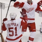 Detroit Red Wings' Valtteri Filppula (51), of Finland, celebrates his goal against the Phoenix Coyotes with teammate Drew Miller during the second period in Game 3 of a first-round series NHL Stanley Cup playoffs hockey game Monday, April 18, 2011, in Glendale, Ariz. (AP Photo/Ross D. Franklin)