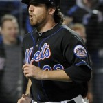 New York Mets' Ike Davis reacts as he comes home after hitting two-run home run during the seventh inning of a baseball game against the Arizona Diamondbacks Friday, April 22, 2011 at Citi Field in New York. (AP Photo/Bill Kostroun)