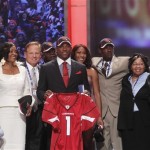 LSU cornerback Patrick Peterson, center, is joined by family and friends after he was selected as the fifth overall pick by the Arizona Cardinals in the first round of the NFL football draft at Radio City Music Hall Thursday, April 28, 2011, in New York. (AP Photo/Jason DeCrow)