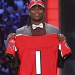 Alabama wide receiver Julio Jones holds up a jersey after he was selected as the sixth overall pick by the Atlanta Falcons in the first round of the NFL football draft at Radio City Music Hall Thursday, April 28, 2011, in New York. (AP Photo/Jason DeCrow)
