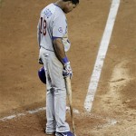Chicago Cubs' Starlin Castro stands at home plate after striking out with two men on base in the seventh inning of a baseball game against the Arizona Diamondbacks on Thursday, April 28, 2011, in Phoenix. (AP Photo/Matt York)