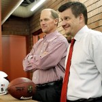 Arizona Cardinals head coach Ken Whisenhunt, left, and Cardinals' President Michael Bidwill listen as first-round draft pick Patrick Peterson speaks to the media, Friday, April 29, 2011, at the Cardinals' practice facility in Tempe, Ariz. Peterson, a cornerback from LSU, was the fifth pick overall in the 2011 NFL football draft. (AP Photo/Matt York)