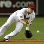Arizona Diamondbacks' Stephen Drew fields a ground ball hit by Chicago Cubs' Aramis Ramirez in the sixth inning during an MLB baseball game Friday, April 29, 2011, in Phoenix. Ramirez was out on the play. (AP Photo/Ross D. Franklin)