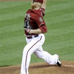 Arizona Diamondbacks pitcher Barry Enright delivers against the Colorado Rockies during the first inning of a baseball game on Wednesday, May 4, 2011, in Phoenix. (AP Photo/Matt York)