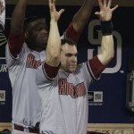 Arizona Diamondbacks catcher Miguel Montero, front, and Juan Gutierrez react towards teammate Gerardo Parra in the ninth inning after Parra's double drove in a run against the San Diego Padres during their baseball game Friday, May 6, 2011, in San Diego. (AP Photo/Gregory Bull)