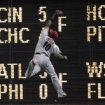 Arizona Diamondbacks outfielder Justin Upton makes a catch at the wall, hit by the San Diego Padres' Cameron Maybin in the eighth inning during their baseball game Friday, May 6, 2011, in San Diego. (AP Photo/Gregory Bull)