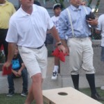 Arizona Cardinals coach Ken Whisenhunt tosses a bag at Doug & Wolf's Inaugural Cornhole Cup. The event was held at Cityscape in downtown Phoenix on Saturday, May 14 2011. Thousands of dollars were raised for The Boys & Girls Clubs of Metropolitan Phoenix. (KTAR)