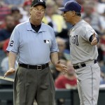 San Diego Padres manager Bud Black argues with umpire Joe West after the Padres' Eric Patterson was ruled out at third for not tagging up on a fly out against the Arizona Diamondbacks during the second inning of a baseball game Tuesday, May 17, 2011, in Phoenix. (AP Photo/Matt York)