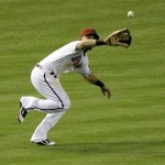 Arizona Diamondbacks' Gerardo Parra catches a fly out by San Diego Padres Ryan Ludwick during the sixth inning of a baseball game Tuesday, May 17, 2011, in Phoenix. (AP Photo/Matt York)