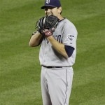San Diego Padres pitcher Tim Stauffer bites on his glove after loading the bases against the Arizona Diamondbacks during the sixth inning of a baseball game Tuesday, May 17, 2011, in Phoenix. (AP Photo/Matt York)