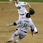 San Diego Padres' Brad Hawpe (11) is forced out by Arizona Diamondbacks' Stephen Drew during the eighth inning of a baseball game Tuesday, May 17, 2011, in Phoenix. Ryan Ludwick was out at first. (AP Photo/Matt York)