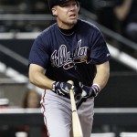 Atlanta Braves' Chipper Jones connects for a double against the Arizona Diamondbacks during the sixth inning of a baseball game on Wednesday, May 18, 2011, in Phoenix. (AP Photo/Matt York)