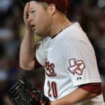 Houston Astros starting pitcher Bud Norris wipes his forehead during a rough second inning where he gave up two runs to the Arizona Diamondbacks during a baseball game on Saturday, May 28, 2011, in Houston. (AP Photo/Pat Sullivan)