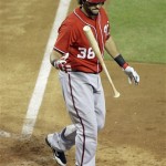 Washington Nationals' Michael Morse reacts after striking out against the Arizona Diamondbacks in the eighth inning of an MLB baseball game on Saturday, June 4, 2011, in Phoenix. The Diamondbacks won 2-0. (AP Photo/Paul Connors)