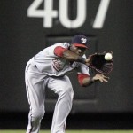 Washington Nationals center fielder Roger Bernadina charges in to make the catch on a fly ball hit for an out by Arizona Diamondbacks' Kelly Johnson in the third inning of an MLB baseball game on Sunday, June 5, 2011, in Phoenix. (AP Photo/Paul Connors)