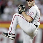 Washington Nationals' Jason Marquis winds up to deliver a pitch against the Arizona Diamondbacks in the second inning of an MLB baseball game on Sunday, June 5, 2011, in Phoenix. (AP Photo/Paul Connors)