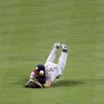 Washington Nationals centerfielder Rick Ankiel dives for but cannot make the catch on a flyball hit for a single by Arizona Diamondbacks' Chris young in the ninth inning of a baseball game Sunday, June 5, 2011, in Phoenix. (AP Photo/Paul Connors)