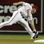 Arizona Diamondbacks' Stephen Drew is unable to come up with a ball hit by San Francisco Giants' Cody Ross during the fifth inning of an MLB baseball game Thursday, June 16, 2011, in Phoenix. (AP Photo/Ross D. Franklin)